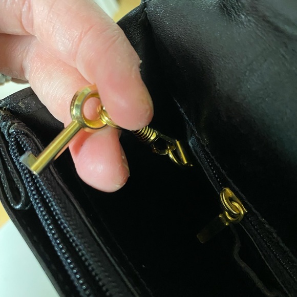 Bally Black and Gold Leather Wristlet Clutch with Elegant Clasp